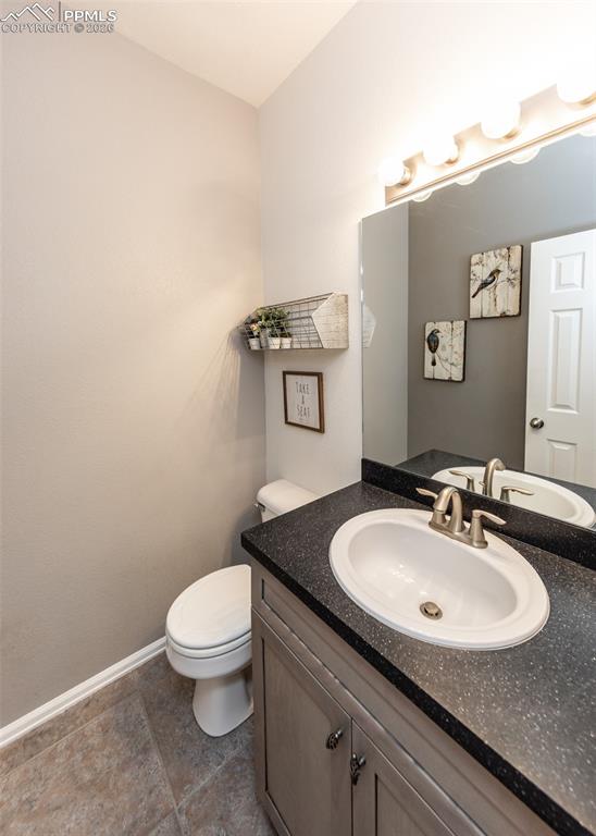 Image 19 of 50: Main-level half bath!