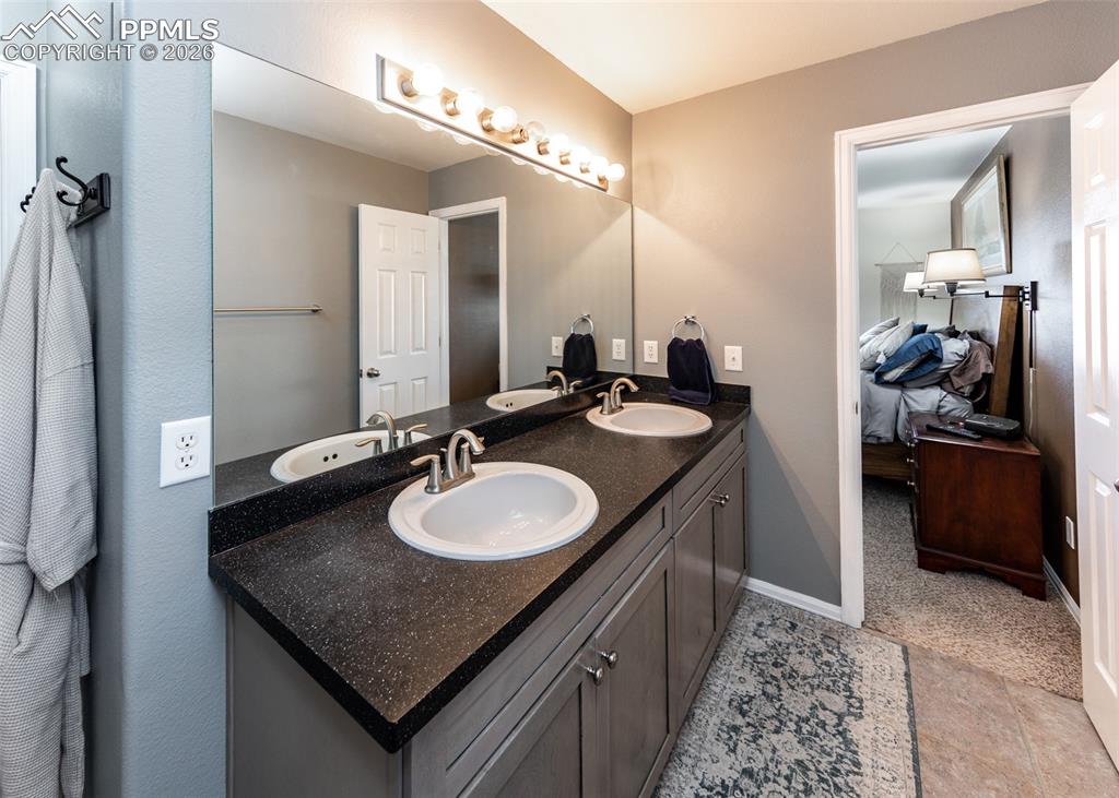 Image 26 of 50: Double vanity in primary bath!