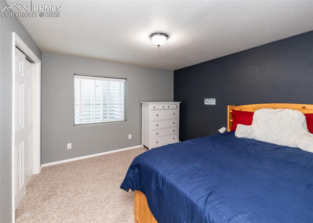 Image 37 of 50: 10x11 bedroom #5 is on the basement level!