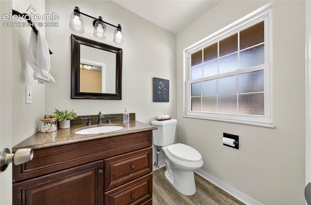 Image 14 of 27: main level powder room