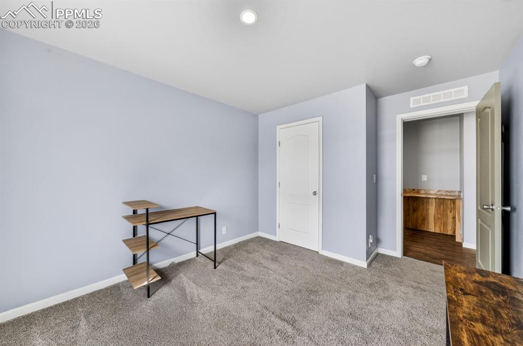 Image 28 of 38: Bedroom