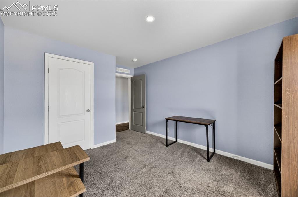 Image 30 of 38: Bedroom