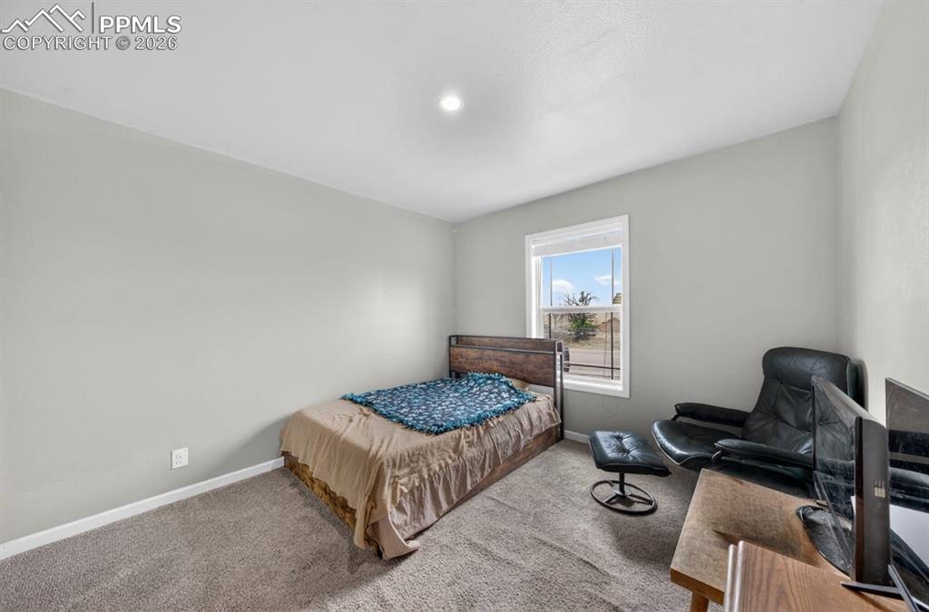 Image 33 of 38: Bedroom