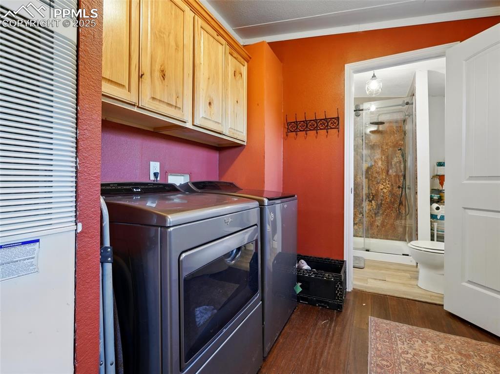 Image 16 of 45: Laundry room with Primary bath access