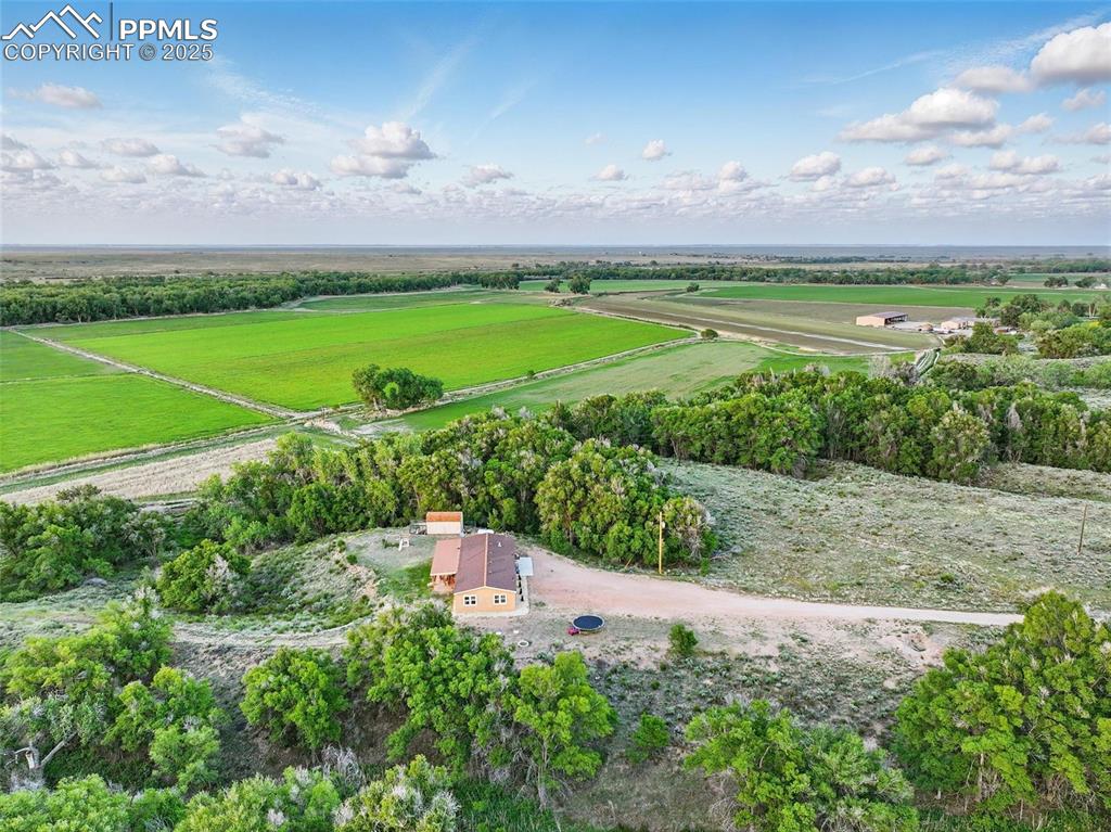 Image 39 of 45: Aerial view of sparsely populated area with abundant farmland