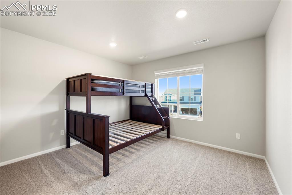 Image 16 of 38: Bedroom