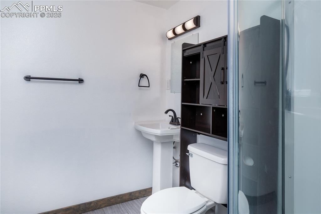 Image 20 of 29: Lower Level Bathroom