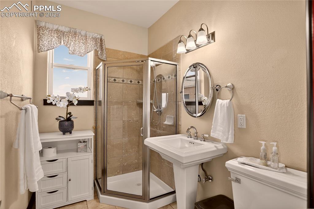 Image 13 of 46: Main level 3/4 bath