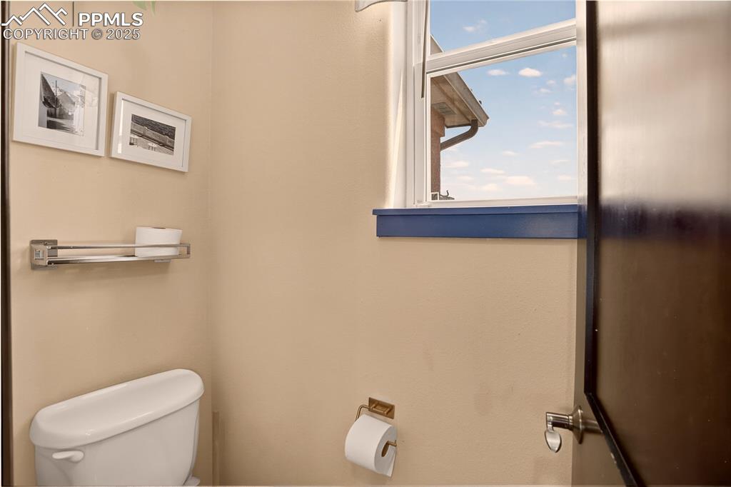 Image 18 of 46: Main level powder room