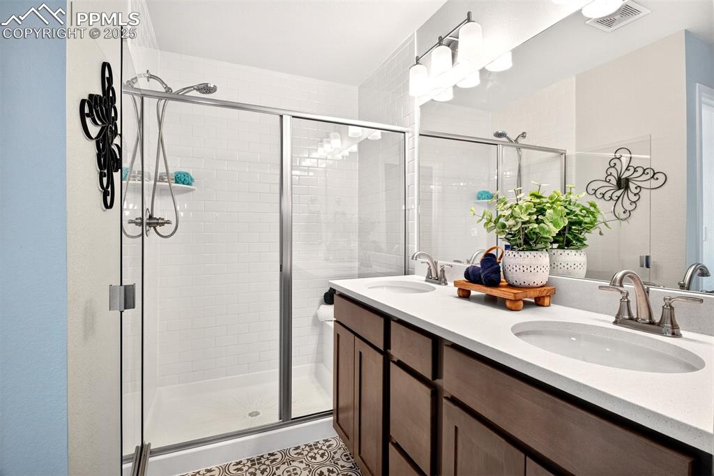 Image 15 of 29: Another view of primary bathroom. 