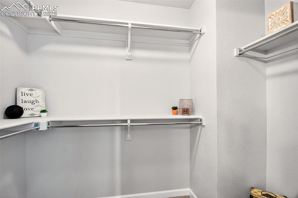 Image 16 of 29: 6x8 primary closet.