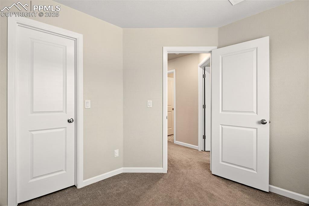 Image 21 of 29: Bedroom #3 w/walk in closet. 