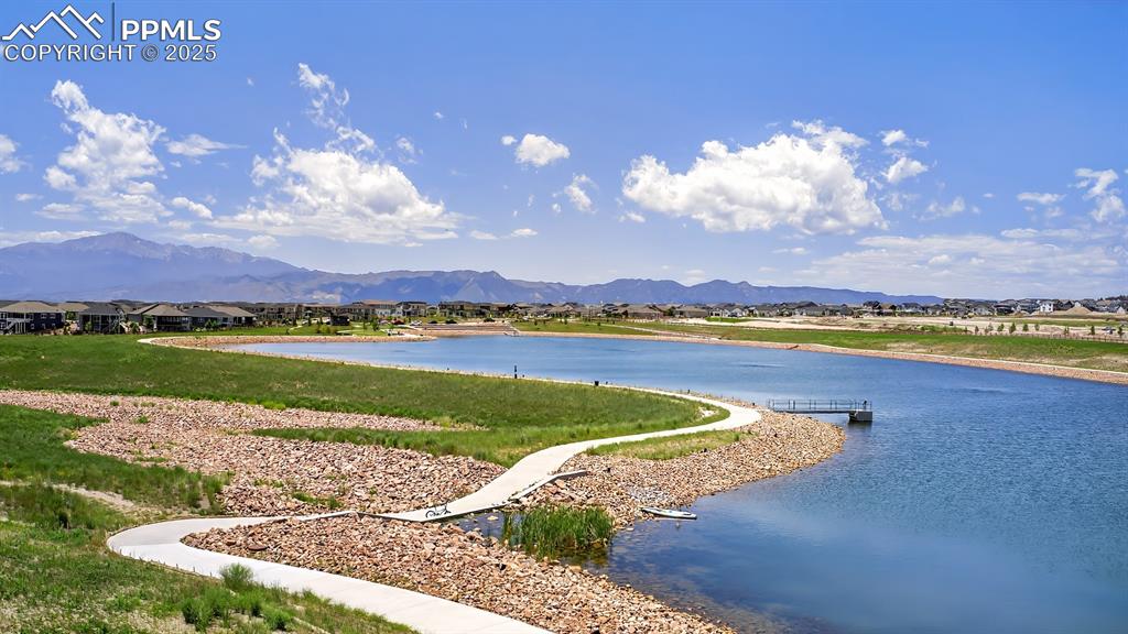 Image 29 of 29: Wolf Ranch Lake with views of Pikes Peak! Relax and enjoy paddleboarding, k