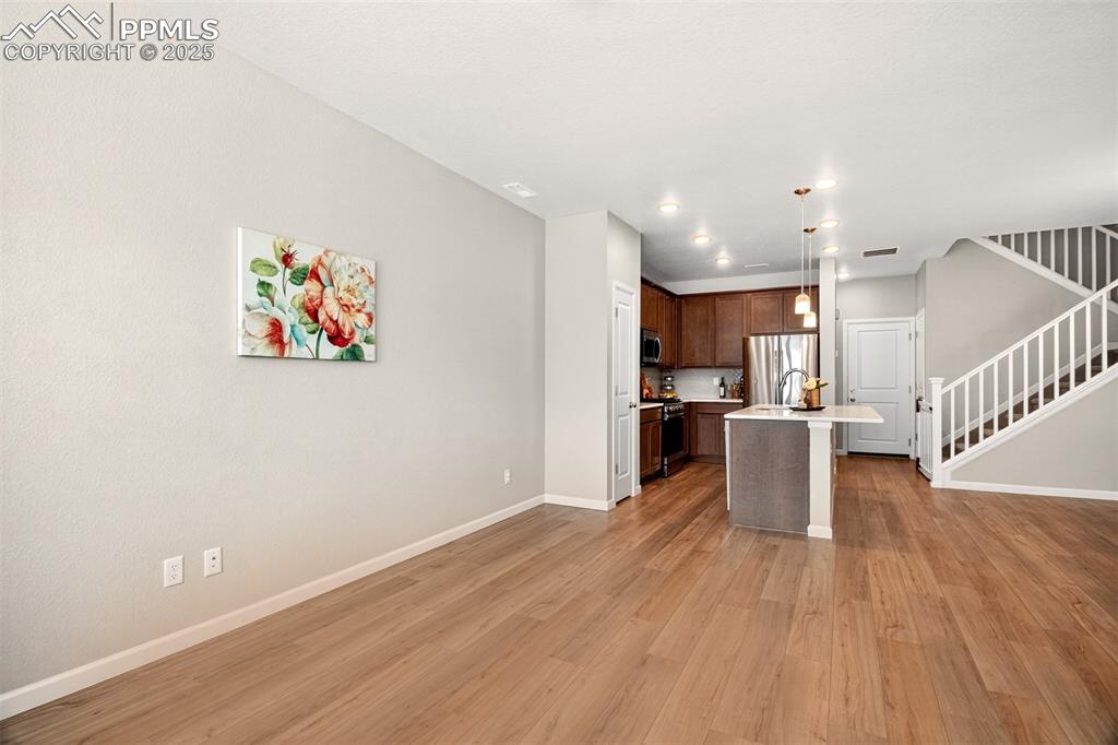 Image 8 of 29: Open concept living room/kitchen. 