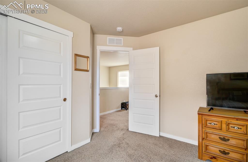 Image 23 of 36: Bedroom