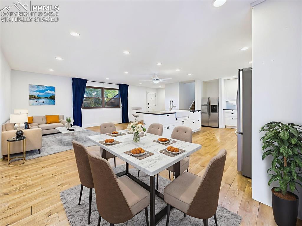 Image 17 of 50: Virtually staged to demonstrate a welcoming and functional layout, this ope