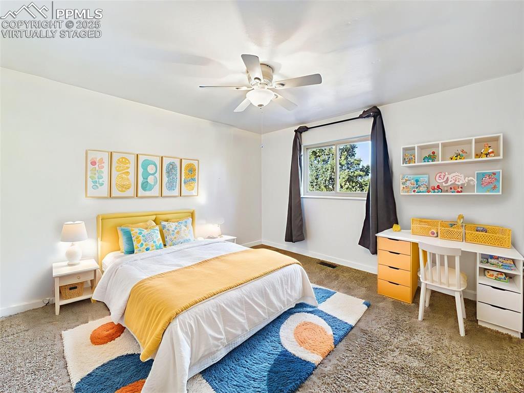 Image 32 of 50: virtually staged Charming and colorful, this room is ideal for a child’s sp