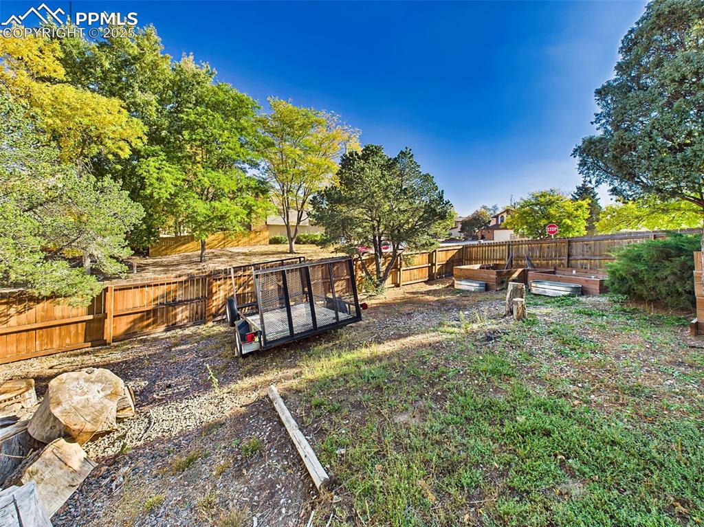 Image 44 of 50: Corner lot offers extra privacy and usability with side yard access, plante