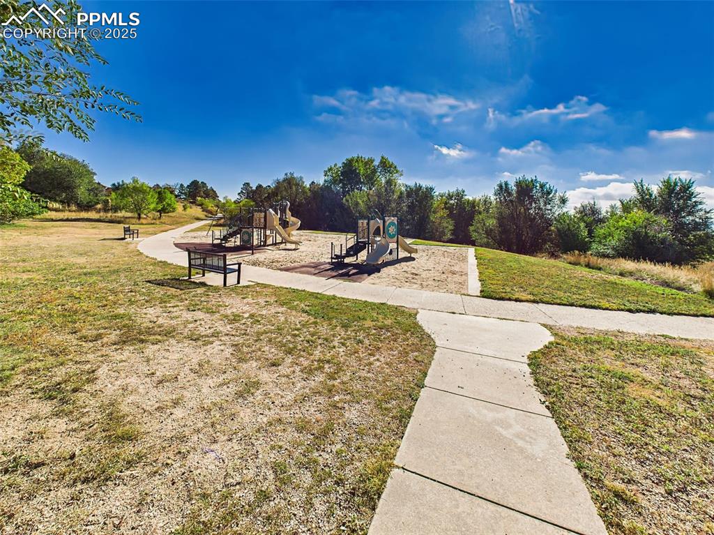 Image 48 of 50: Enjoy peaceful strolls or active playtime with access to a second park feat