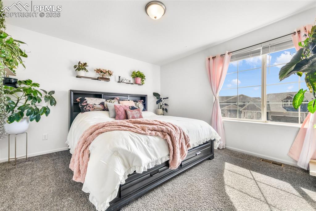 Image 18 of 49: Master Bedroom