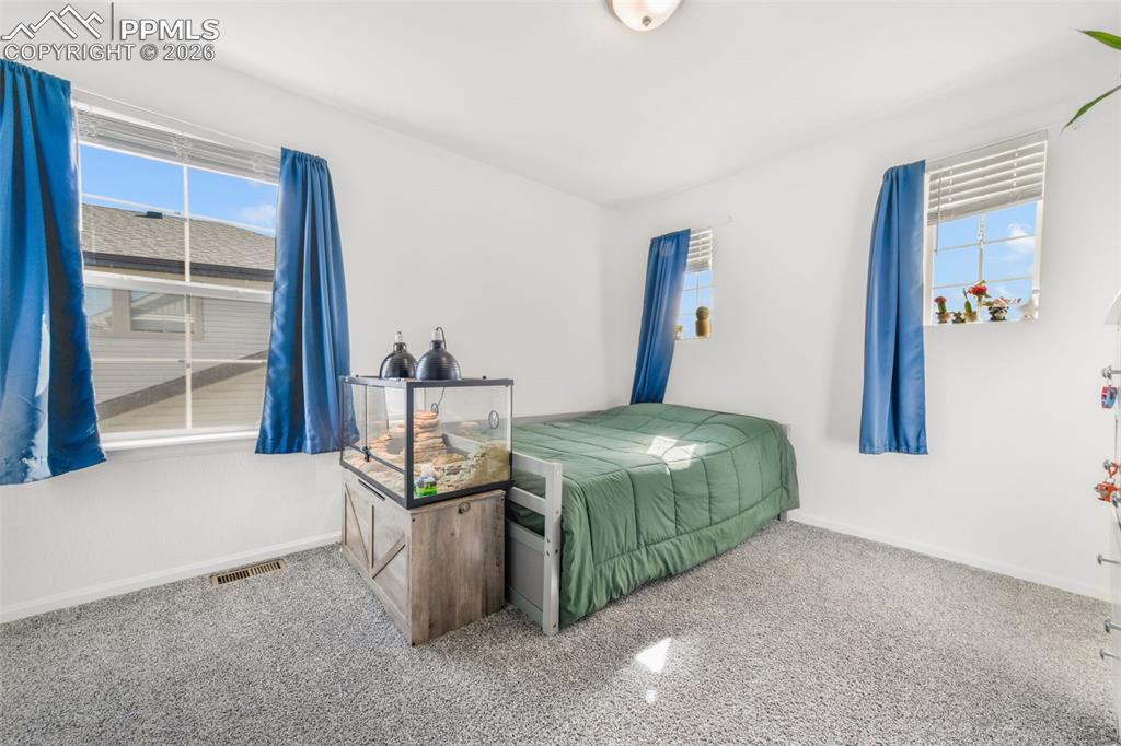 Image 28 of 49: Bedroom