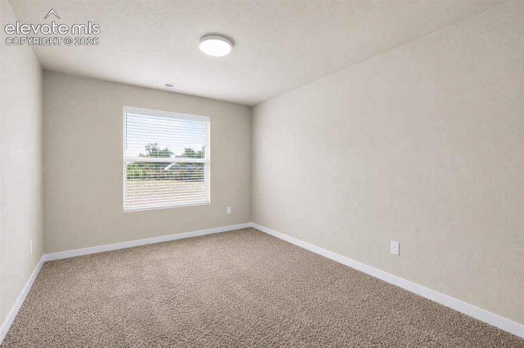 Image 15 of 33: Bedroom