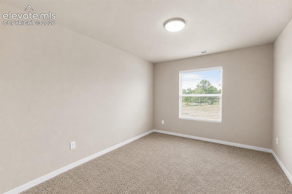 Image 19 of 33: Bedroom