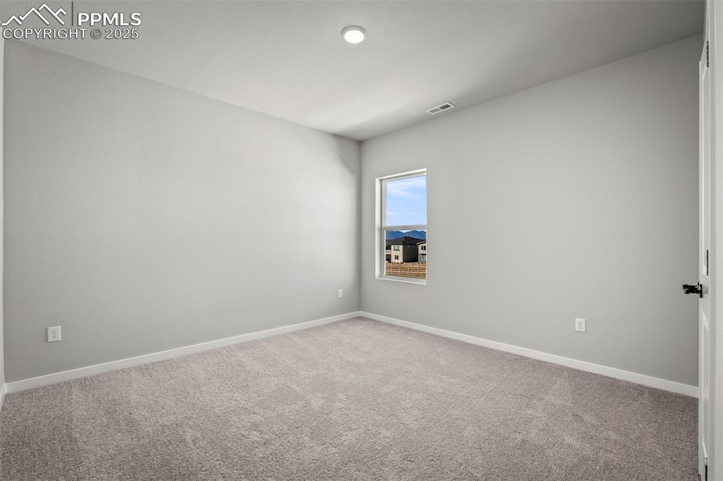 Image 25 of 38: Bedroom