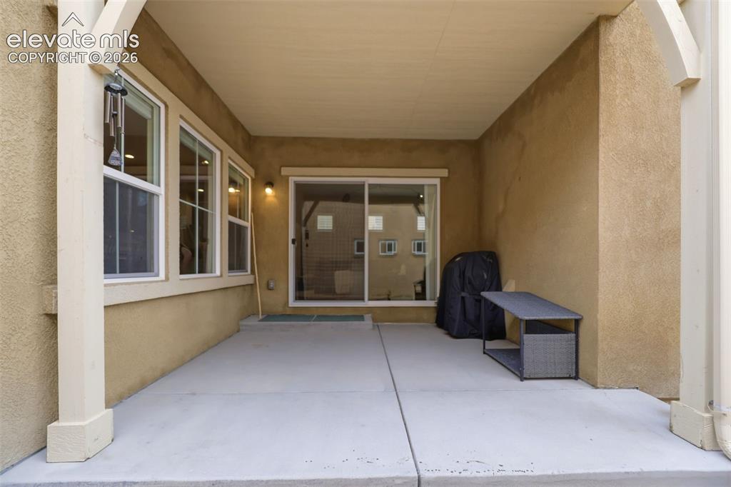 Image 17 of 48: Covered patio off the living area