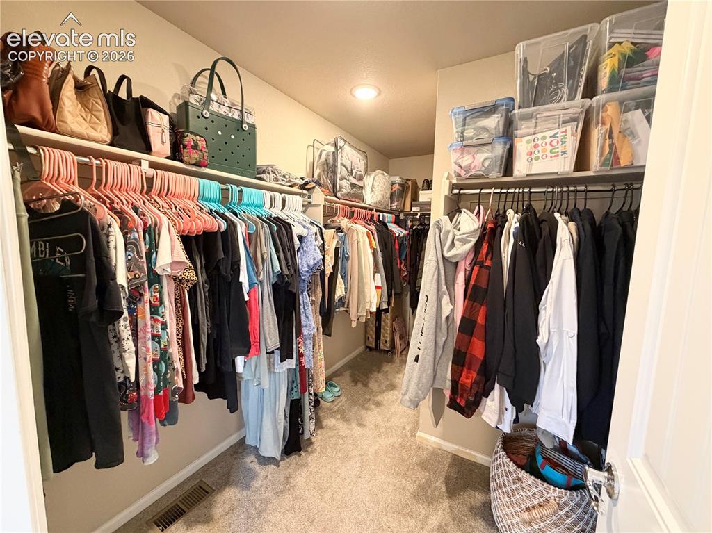 Image 18 of 27: Walk-In Closets