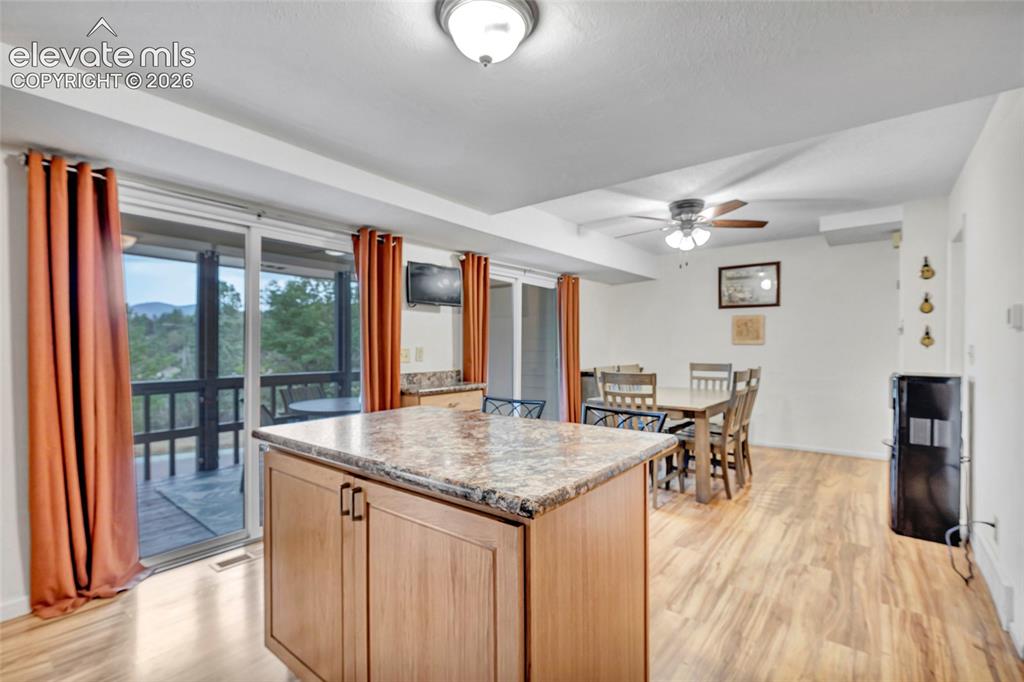 Image 16 of 44: Kitchen and dining