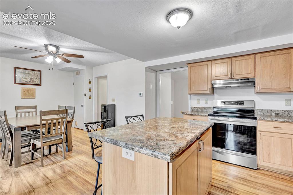 Image 17 of 44: kitchen and dining