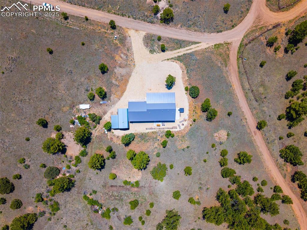 Image 19 of 41: Aerial view of property and surrounding area featuring rural landscape