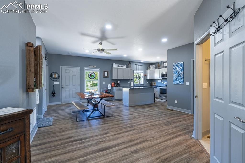 Image 2 of 41: Foyer entrance featuring recessed lighting, ceiling fan, and dark wood-styl