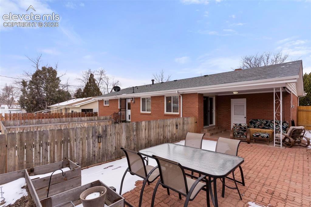 Image 14 of 40: Upper living area private patio