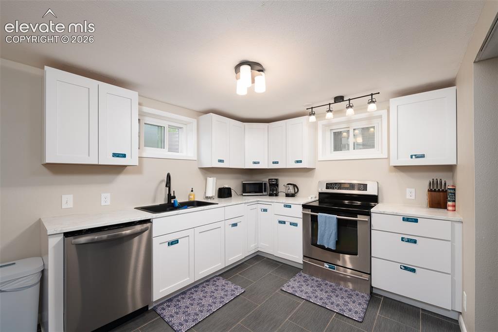 Image 20 of 40: Custom Built Cabinets