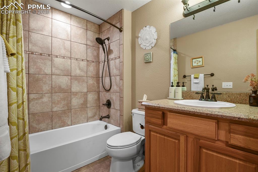 Image 36 of 49: Lower level full bath 