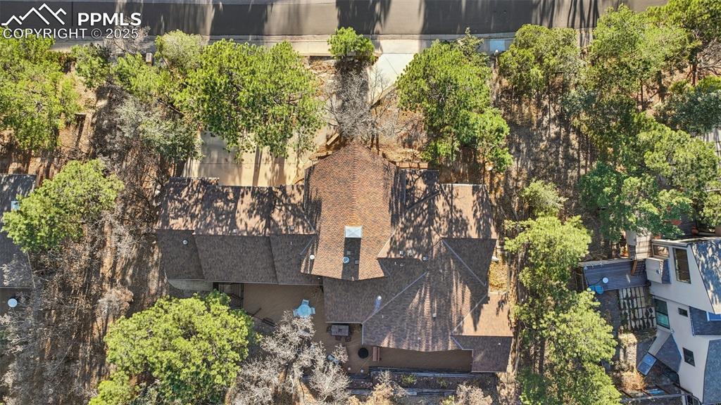 Image 11 of 48: Aerial view of property and surrounding area