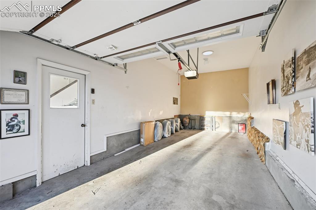 Image 45 of 48: Deep third stall garage.