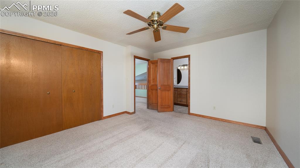 Image 11 of 36: Master bedroom, bathroom access