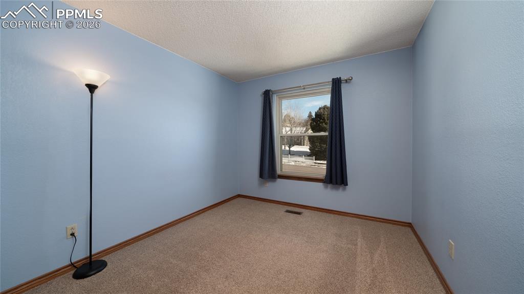 Image 14 of 36: Second bedroom