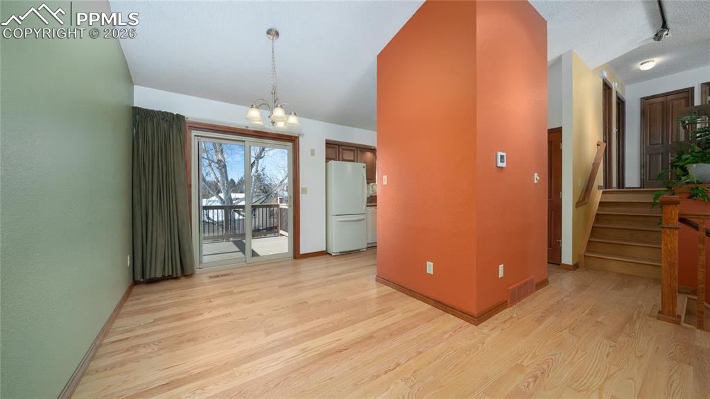 Image 8 of 36: Hardwood, dining 