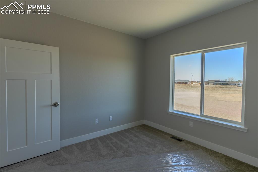 Image 32 of 47: #2 Bedroom with carpet