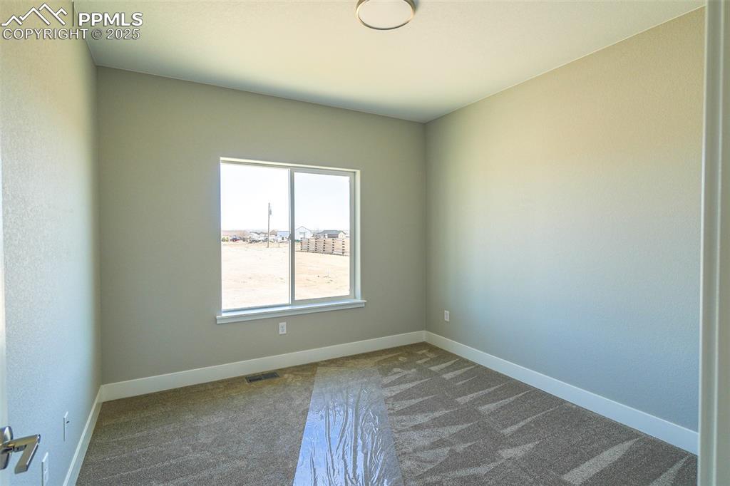 Image 33 of 47: #3 Bedroom featuring carpet floors