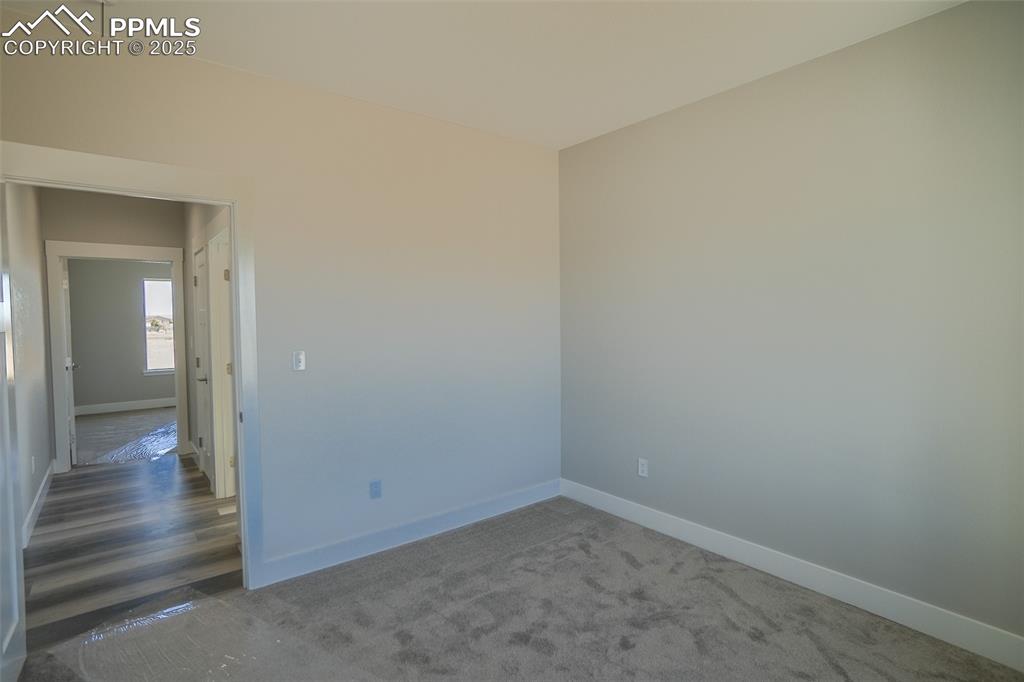 Image 34 of 47: #3 Bedroom with Lux style floors