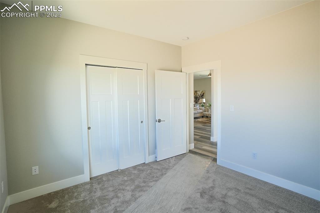 Image 35 of 47: Unfurnished #3 bedroom featuring a closet and carpet