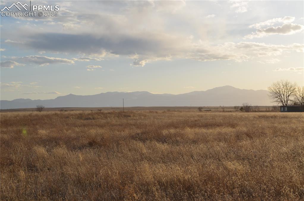 Image 46 of 47: Property view of mountains featuring a rural view