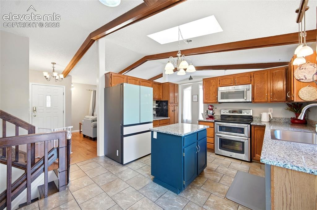 Image 5 of 50: GORGEOUS WOOD BEAMED CEILINGS.