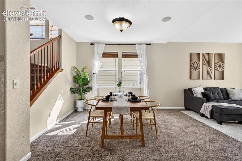 Image 3 of 28: Recessed ceiling lighting, a ceiling-mounted light fixture, and a stairway 