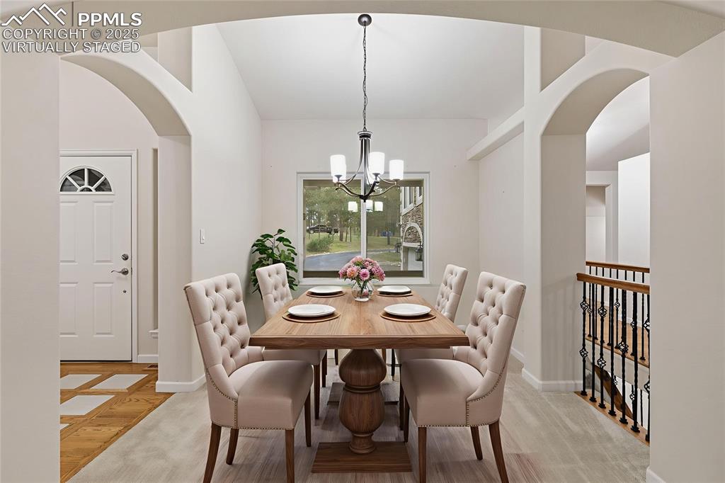 Image 15 of 50: Dining Room virtually staged